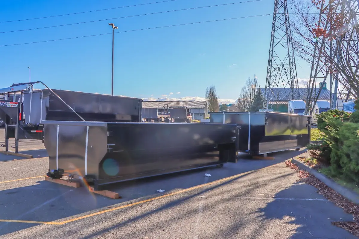 Roll-off dumpster ready for waste disposal at job site for Yard Waste Dumpster Rental in Carthage